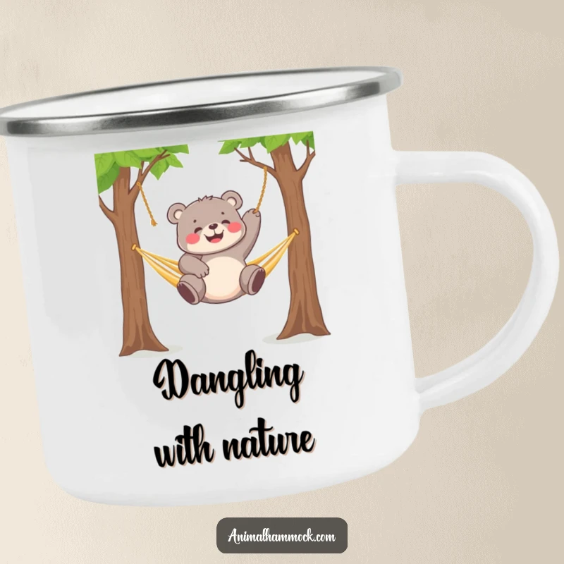 Funny chubby bear cub gleefully dangling from a hammock strung between two trees, perfect for this camping mug.