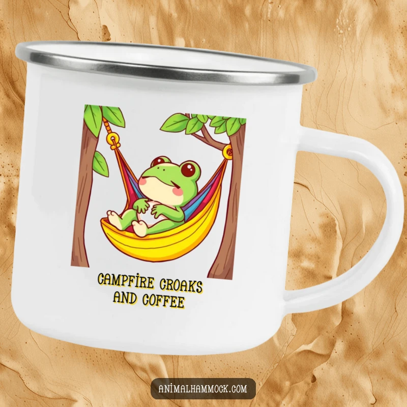 Funny frog relaxing in a brightly colored hammock, depicted on a durable camping mug for outdoor adventures.
