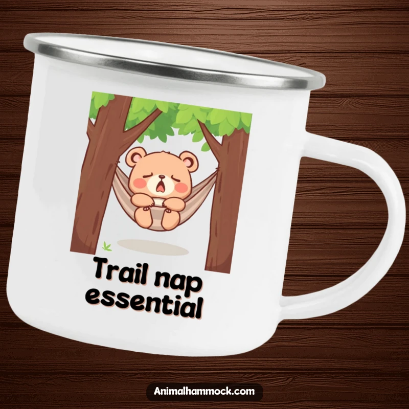 Funny yawning bear cub dozing in a hammock between trees, printed on a rugged camping mug, perfect for enjoying beverages during outdoor relaxation.