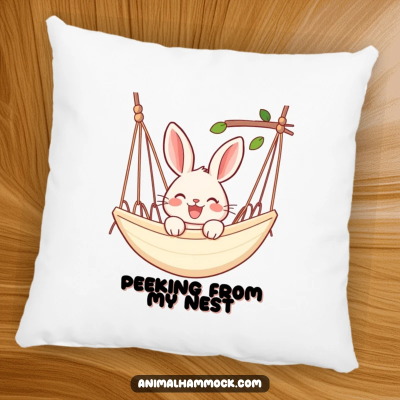 Funny rabbit pillow featuring a joyful rabbit peeking over the edge of a hammock, providing a soft and relaxing decorative touch.
