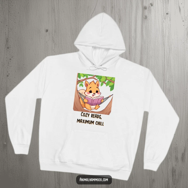 Funny, cozy hoodie showcasing a squirrel passionately reading a book while suspended in a hammock, a warm and humorous gift.