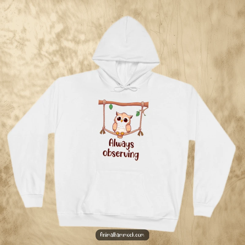 Funny hoodie featuring a curious owl perched on hammock ropes, embodying wisdom and a humorous sense of observation.