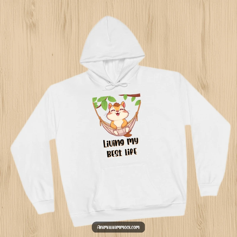 Funny chipmunk giggling in a hammock, captured on a warm hoodie. A humorous and comforting apparel choice.