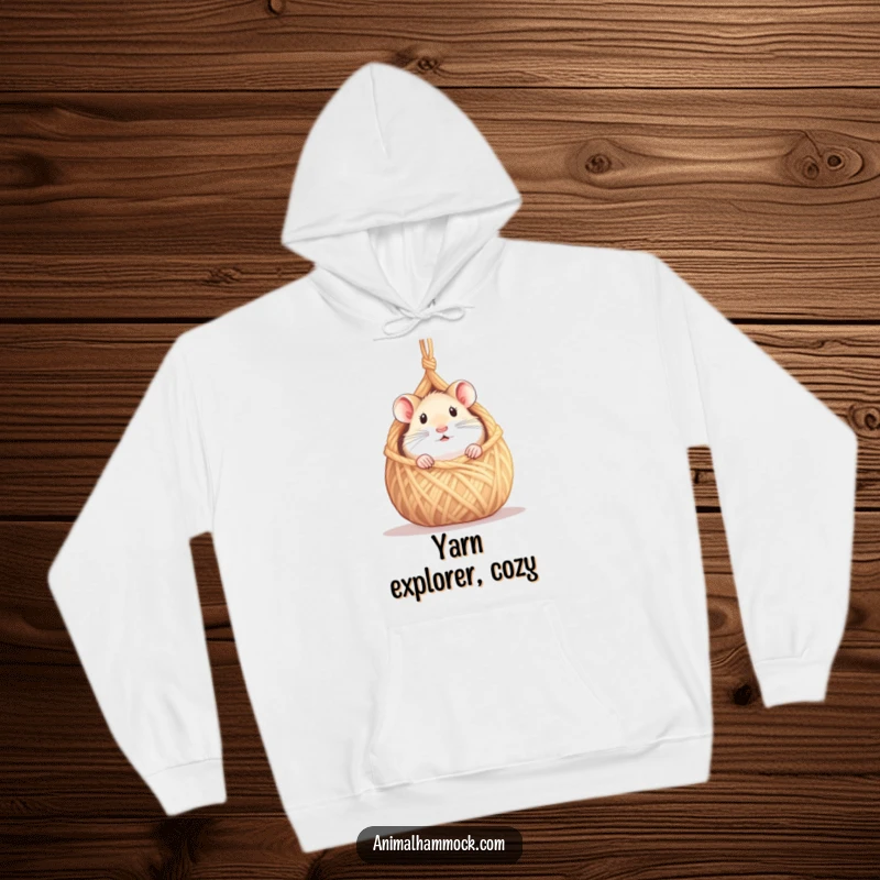 Funny hamster hoodie with a curious hamster peeking from a tiny hammock made of yarn, perfect for cozy days, a unique funny gift.