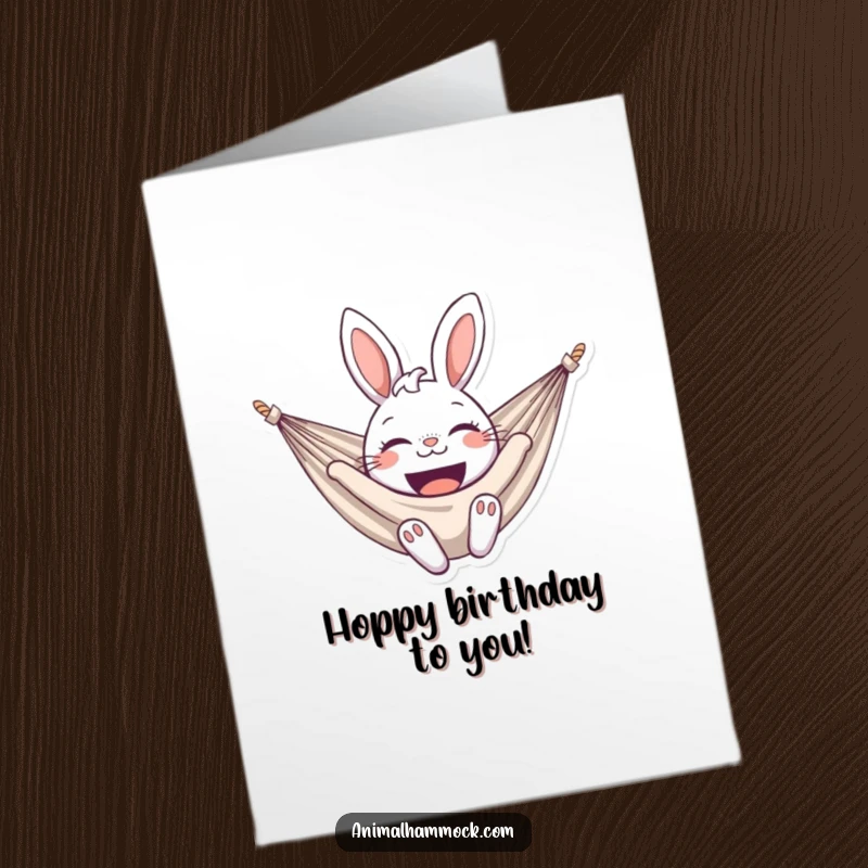 Funny Free Printable Birthday Card: A delighted bunny smiling widely in a hammock, celebrating a birthday with pure glee.