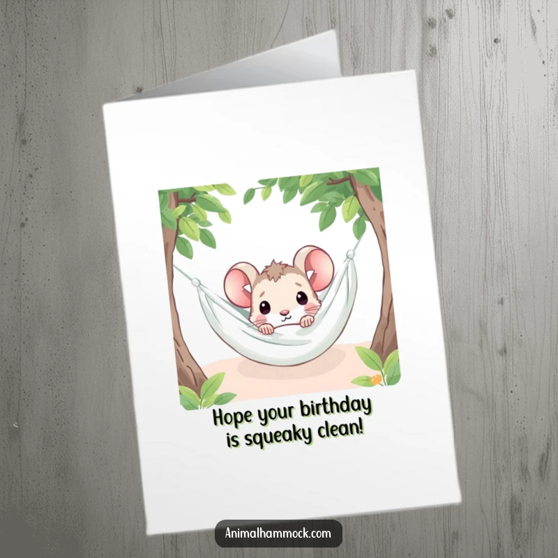 Funny Free Printable Birthday Card: Tiny mouse curiously peeking from under a hammock blanket, a humorous downloadable greeting.