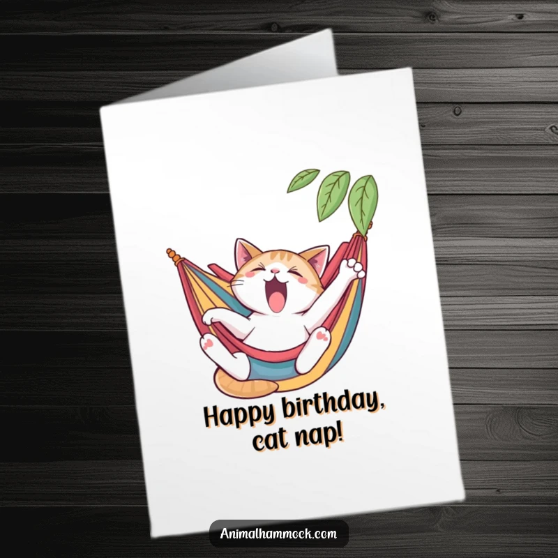 Funny Free Printable Birthday Card: A yawning cat stretching languidly while lounging comfortably in a colorful hammock.