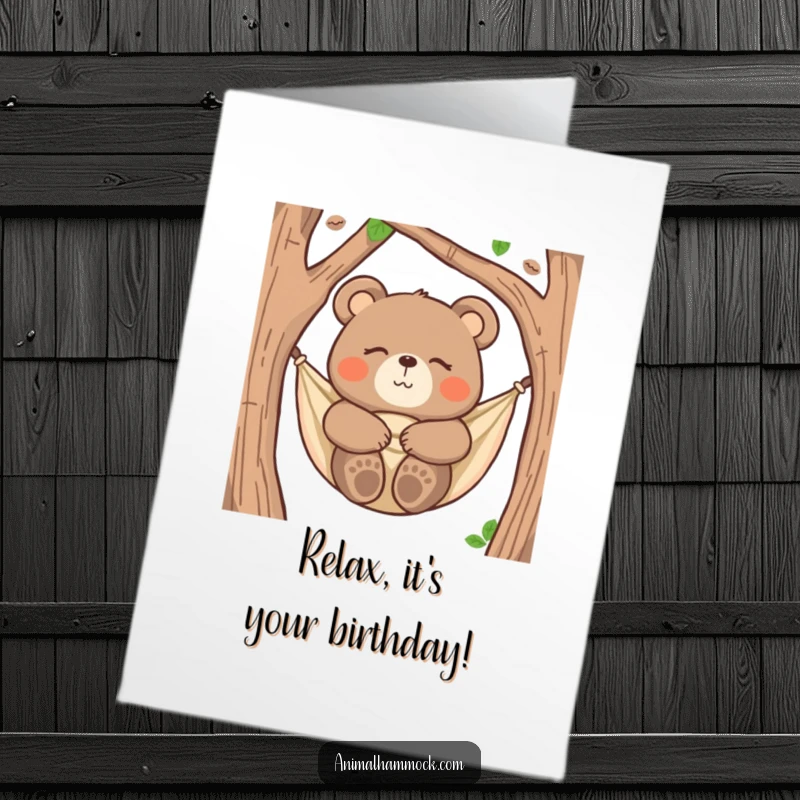Funny Free Printable Birthday Card: A happy, relaxed bear snuggles soundly in a hammock, eyes closed, wishing you a peaceful birthday.