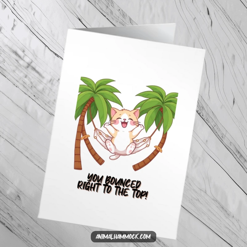 Funny Free Printable Cat Congratulations Card: A fluffy cat bouncing happily on a hammock, celebrating success with tropical flair.