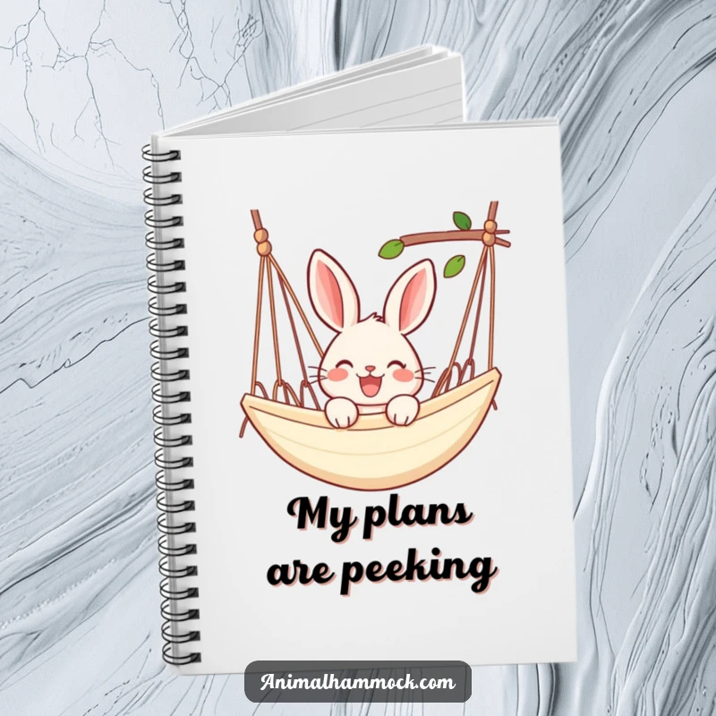 Funny rabbit notebook with a joyful rabbit peeking over the edge of a hammock, ideal for journaling and note-taking.