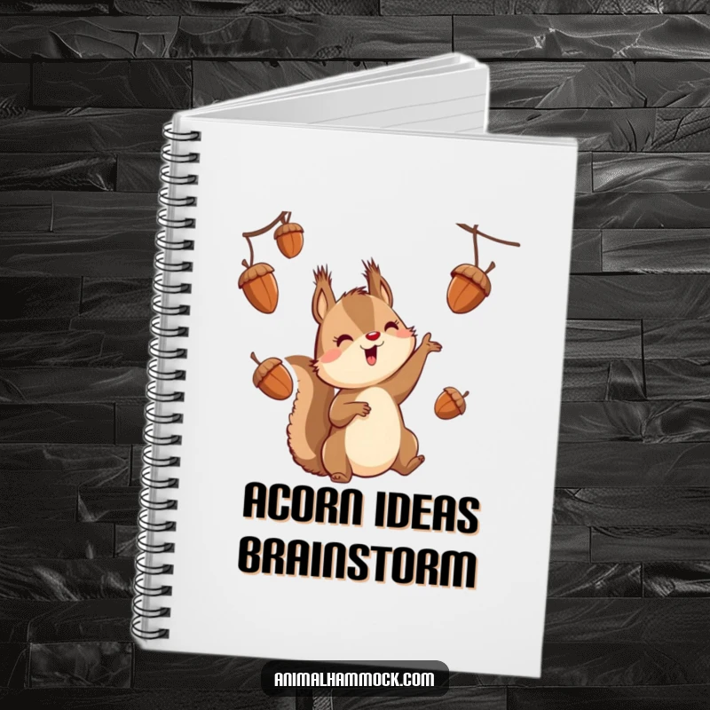 Funny squirrel character juggling acorns while suspended, featured on a notebook cover for a humorous and inspiring writing experience.