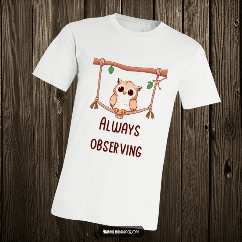 Funny bird t-shirt featuring a curious owl perched on hammock ropes, observing its surroundings with a humorous, wise look.