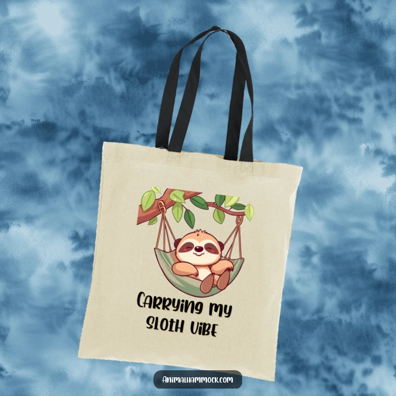 Funny sloth tote bag featuring a cheerful sloth lounging in a hammock, perfect for carrying essentials with a dose of humor. A practical accessory.