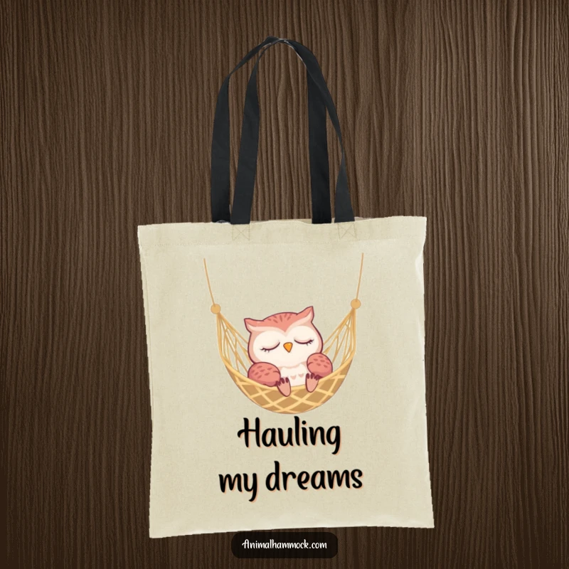 Funny sleepy owl dozing contentedly in a hammock, featured on a durable tote bag for a touch of peaceful humor.